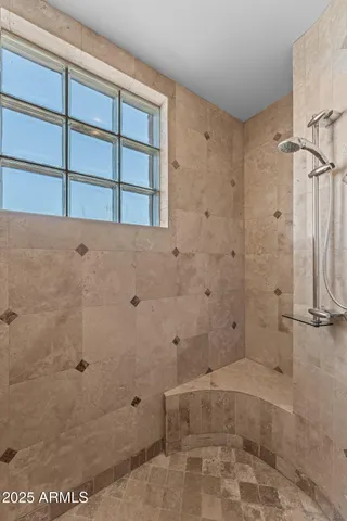 a view of a street with a building in the background