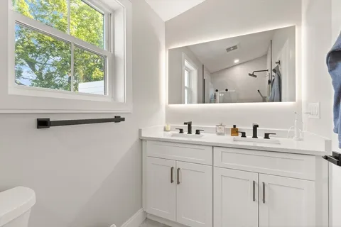 a view of cabinets with wooden floor