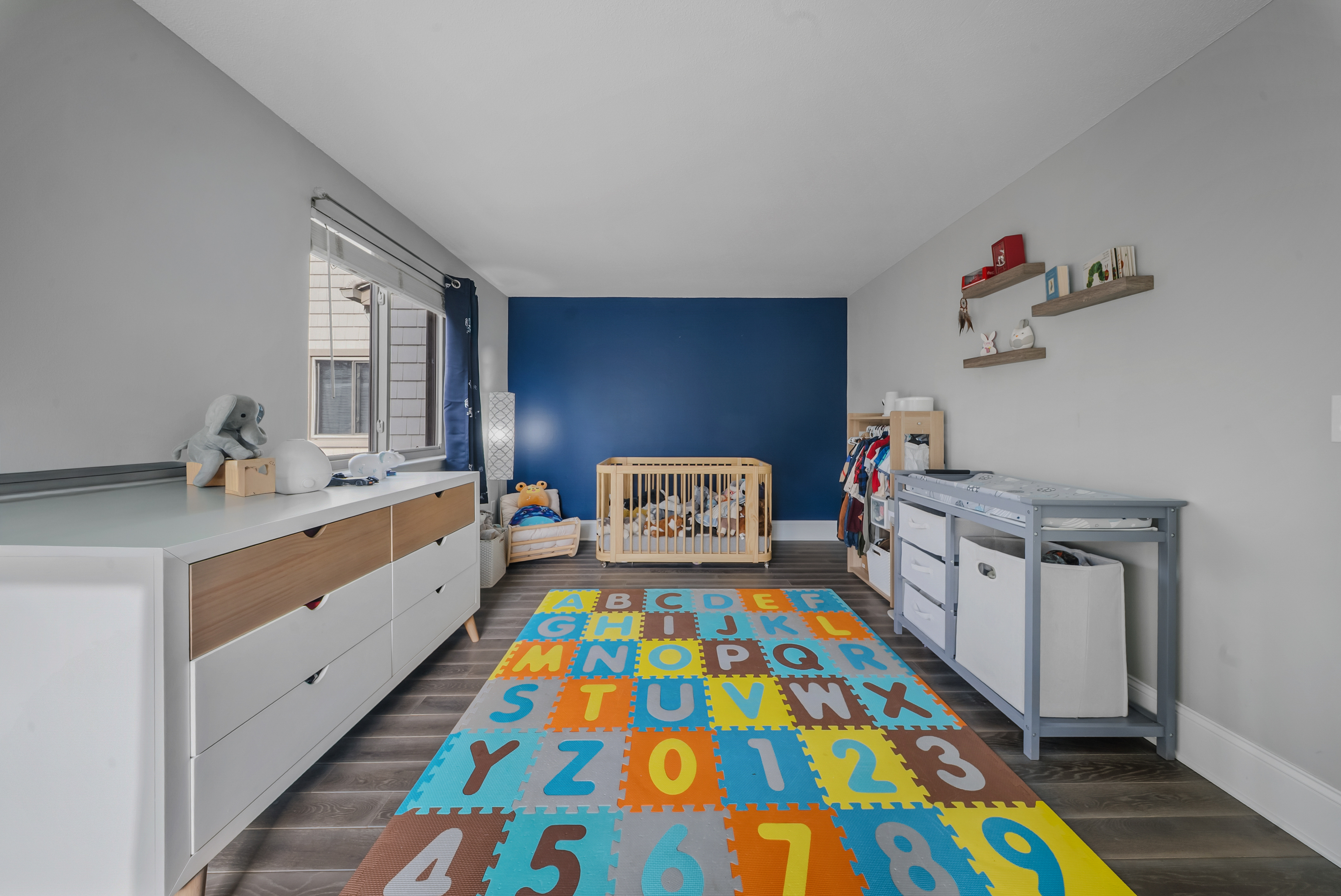 76 River Bend Road, Unit C Stratford, CT 06614 - Photo 15 of 26 a white bed sitting in a bedroom next to a window