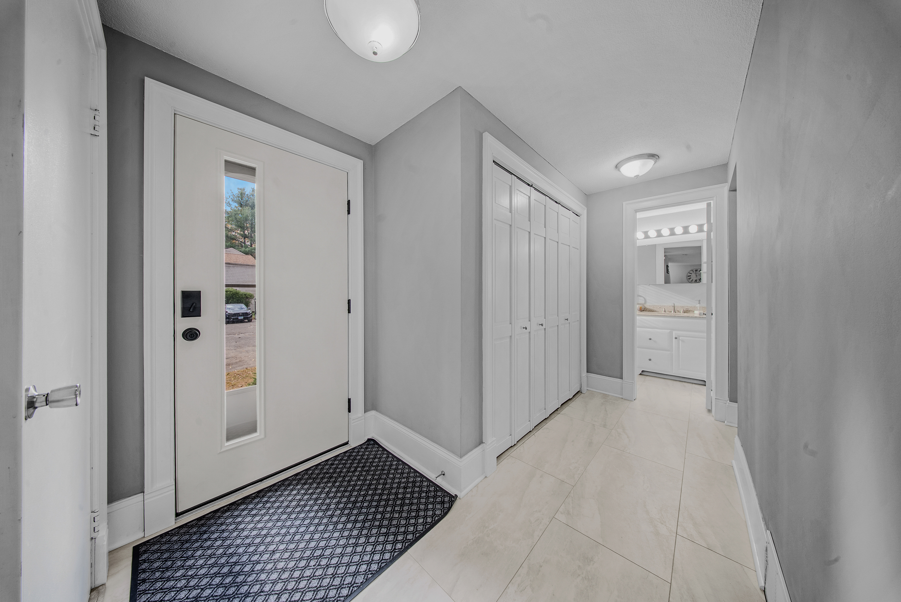 76 River Bend Road, Unit C Stratford, CT 06614 - Photo 2 of 26 a view of a livingroom with wooden floor and cabinet