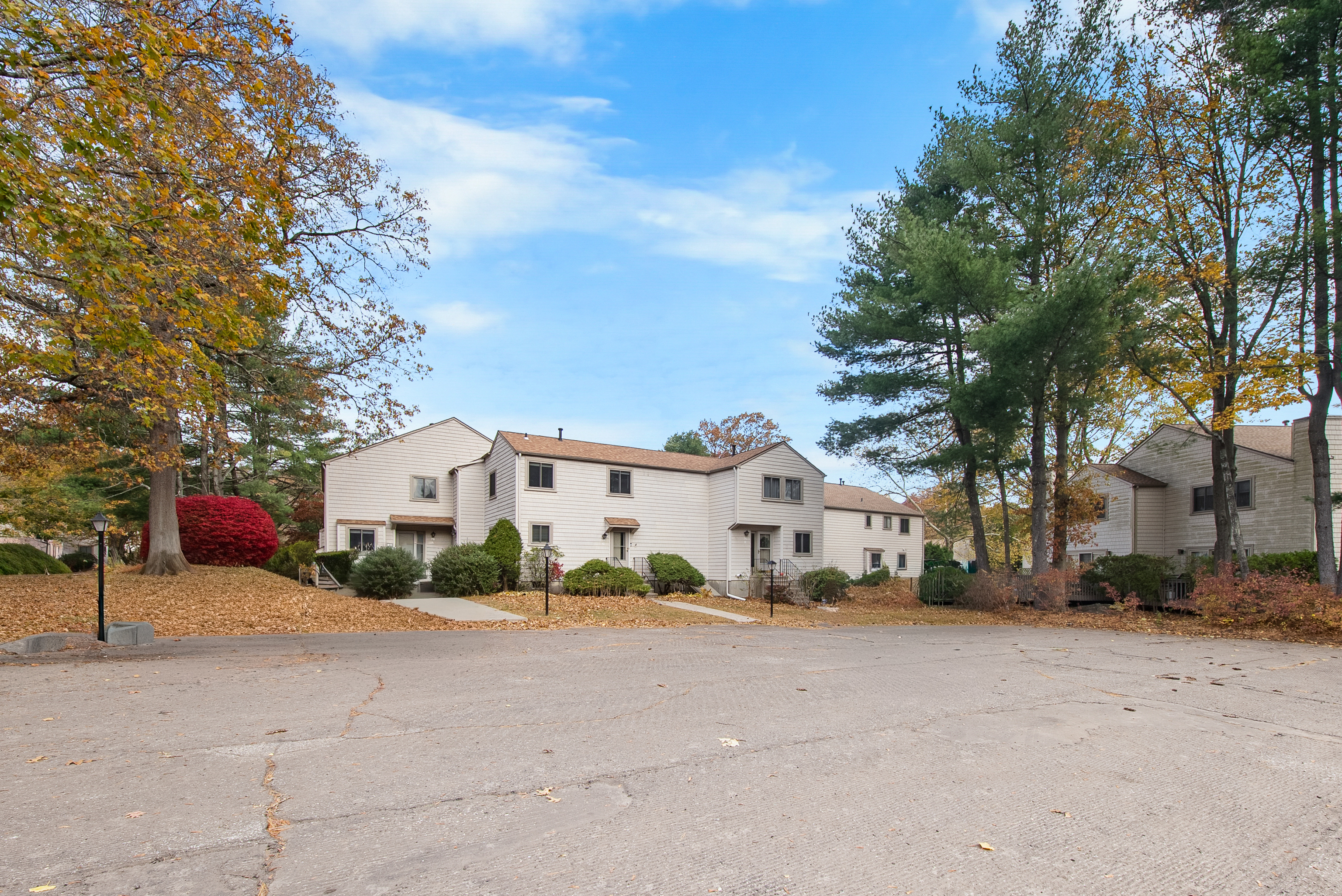 76 River Bend Road, Unit C Stratford, CT 06614 - Photo 22 of 26 a view of street along with house and trees