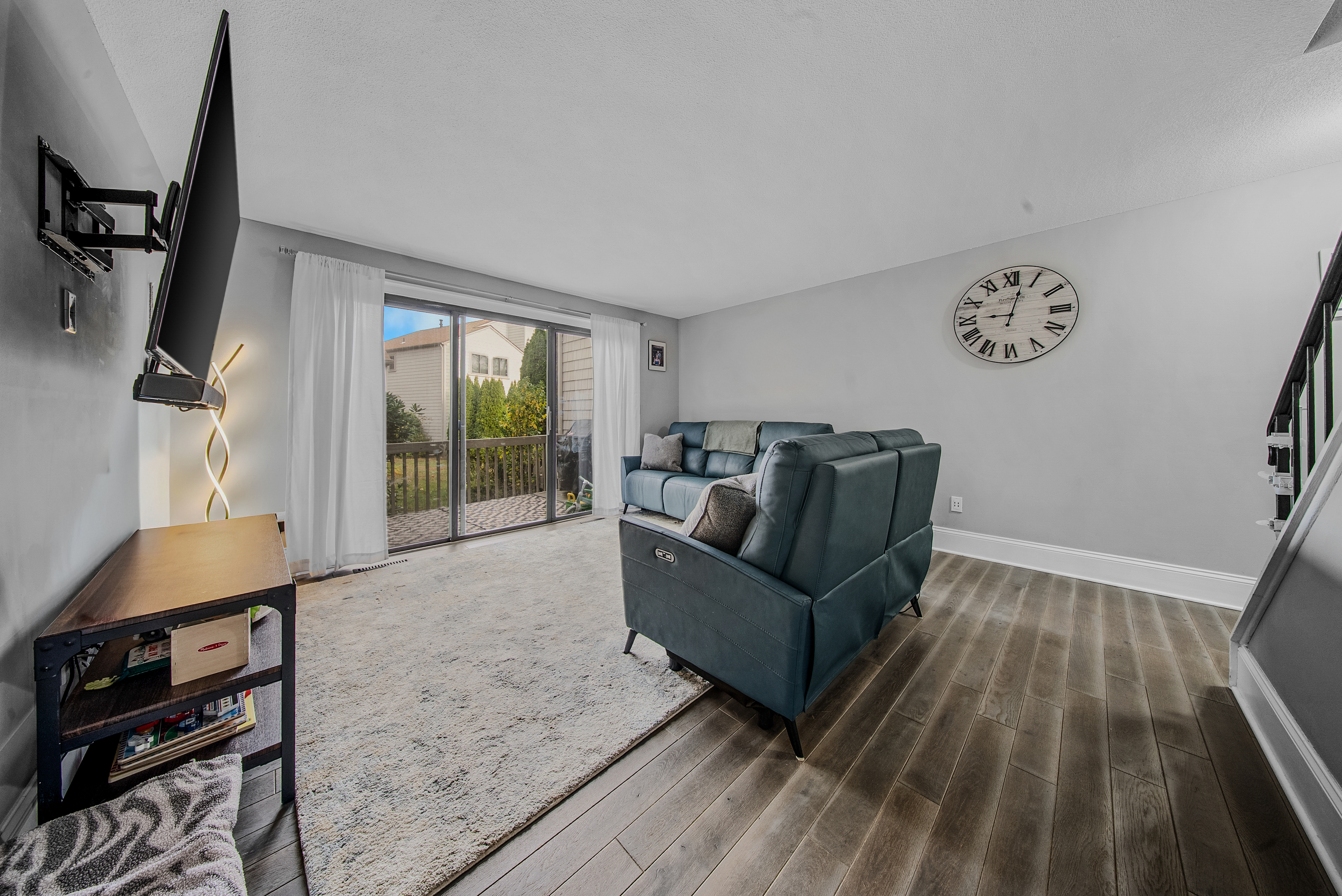 76 River Bend Road, Unit C Stratford, CT 06614 - Photo 10 of 26 a living room with furniture and a window