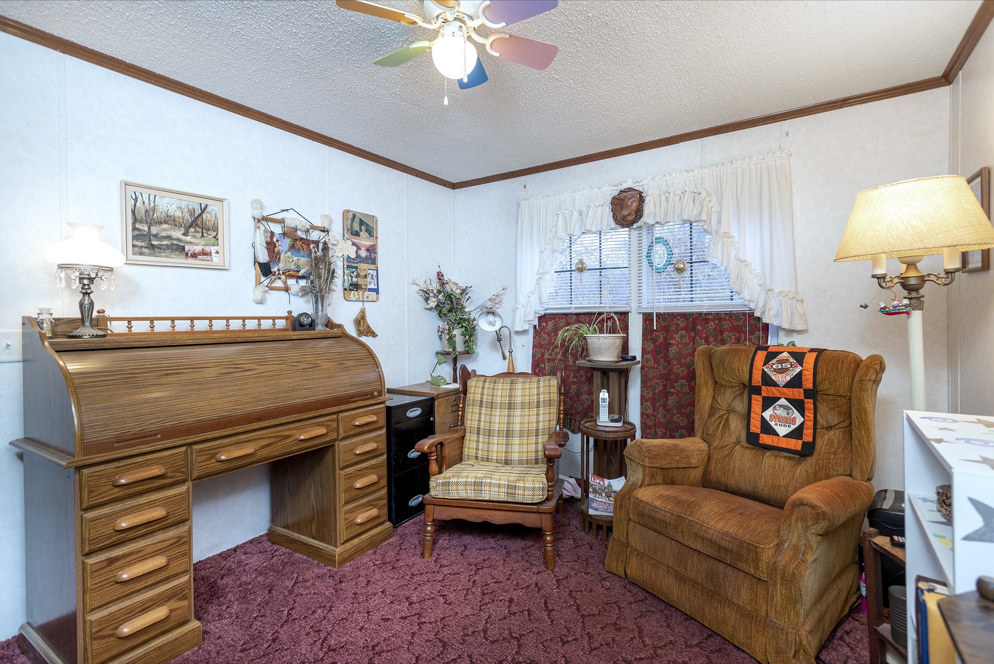 3941 Akin Ridge Road Williamsport, TN 38487 - Photo 12 of 18 a living room with furniture and a chandelier
