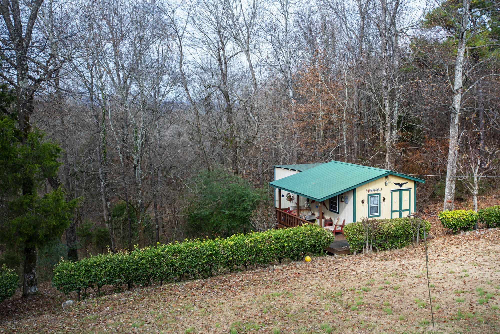 3941 Akin Ridge Road Williamsport, TN 38487 - Photo 18 of 18 a front view of a house with a yard and green space