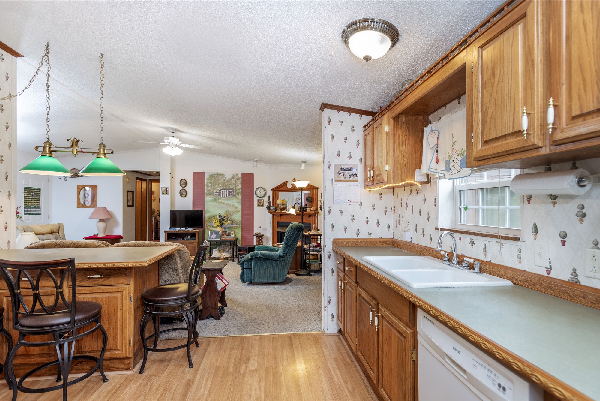 3941 Akin Ridge Road Williamsport, TN 38487 - Photo 5 of 18 a kitchen with a sink stove and cabinets