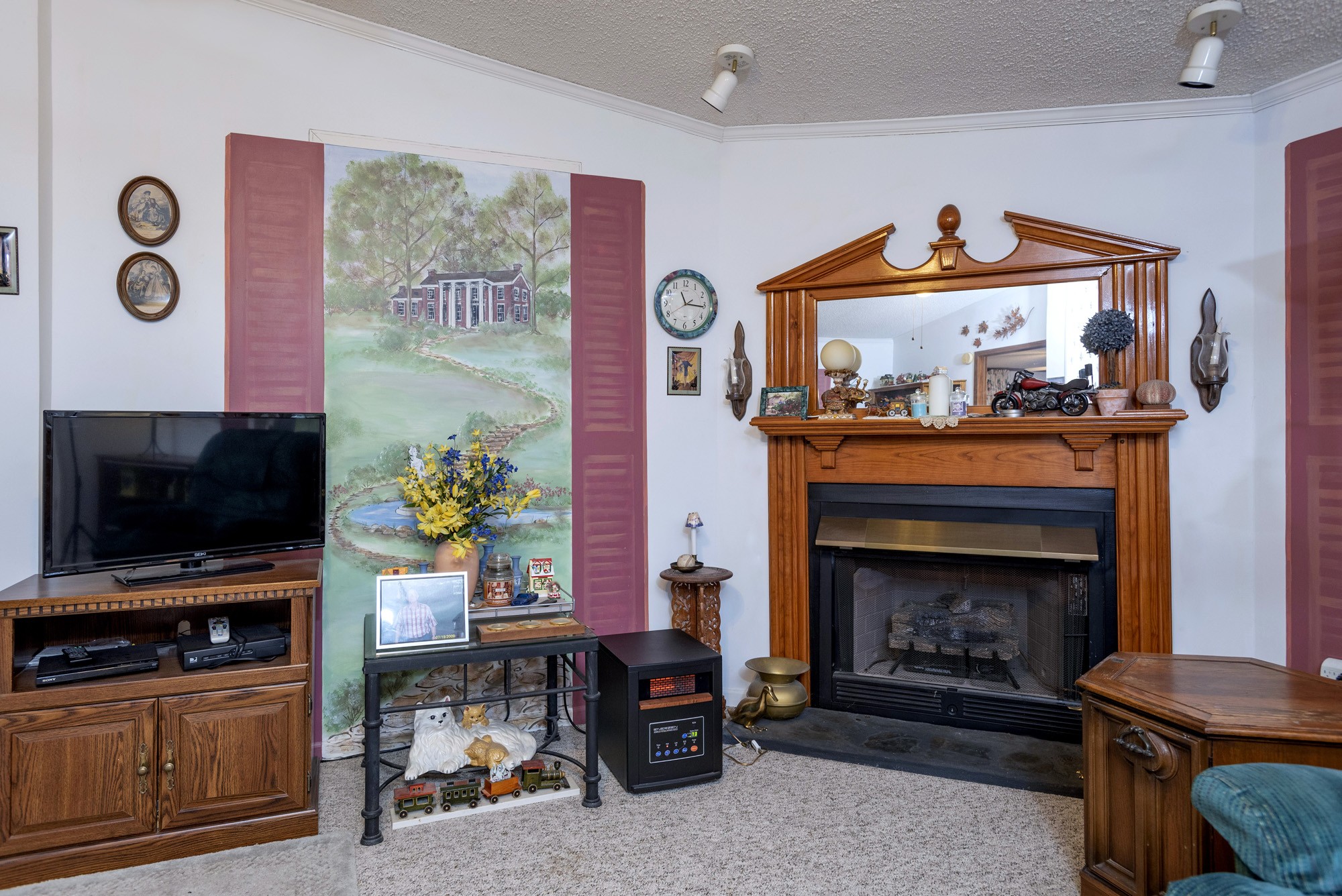 3941 Akin Ridge Road Williamsport, TN 38487 - Photo 7 of 18 a living room with furniture and a fireplace