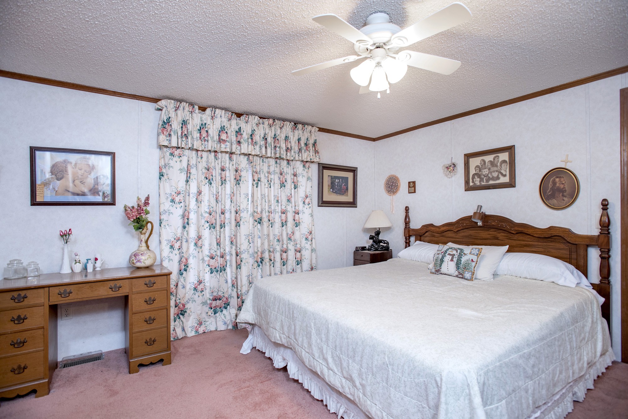 3941 Akin Ridge Road Williamsport, TN 38487 - Photo 8 of 18 a bedroom with a bed and a chandelier