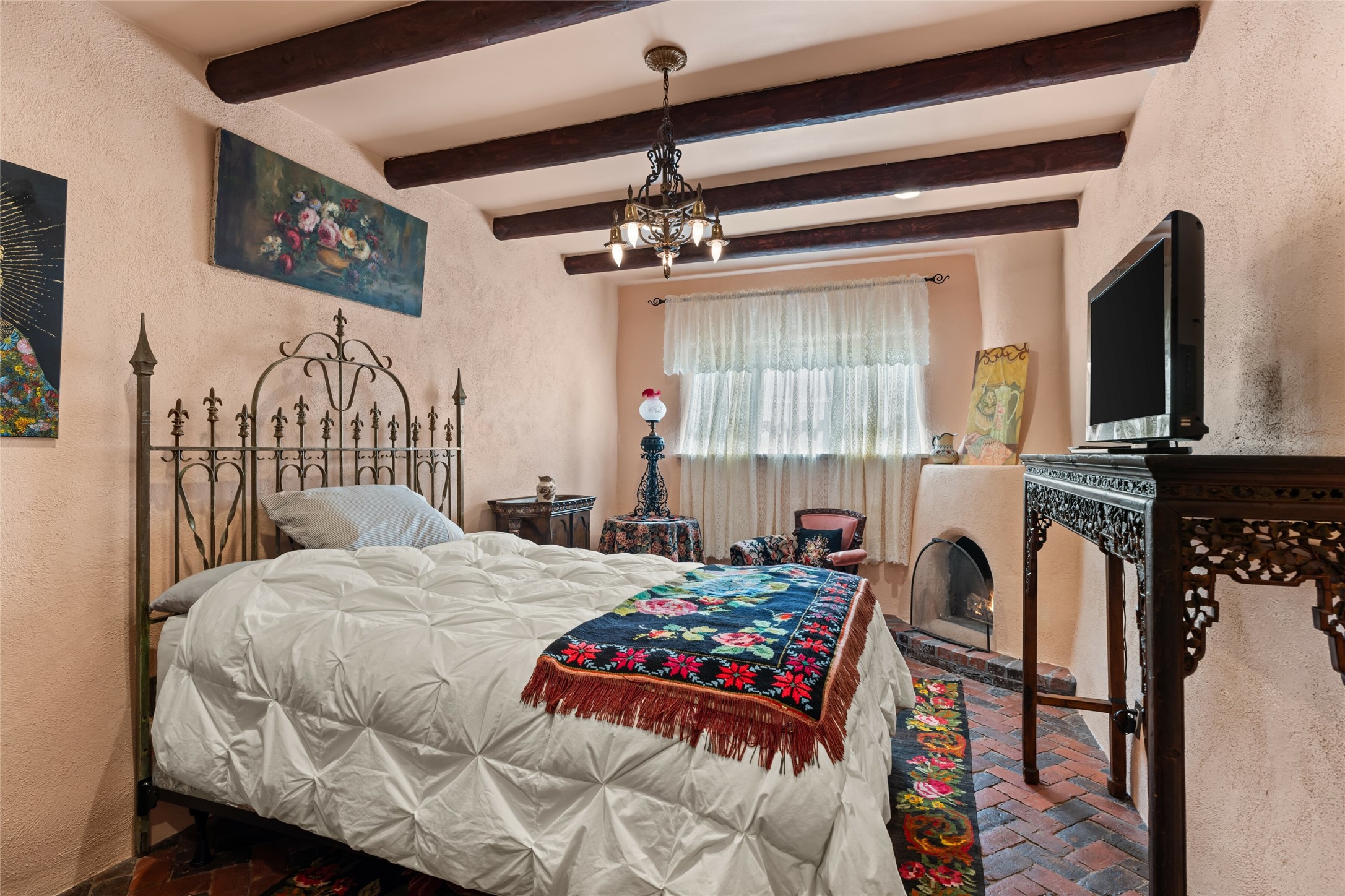 224 Artist Road, Unit 1 Santa Fe, NM 87501 - Photo 11 of 22 Bedroom w/ Corner Kiva Fireplace