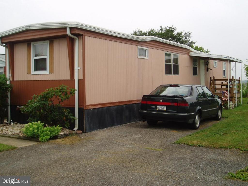 68 Ridgewood Manor Manheim, PA 17545 - Photo 2 of 4 a car parked in front of a house