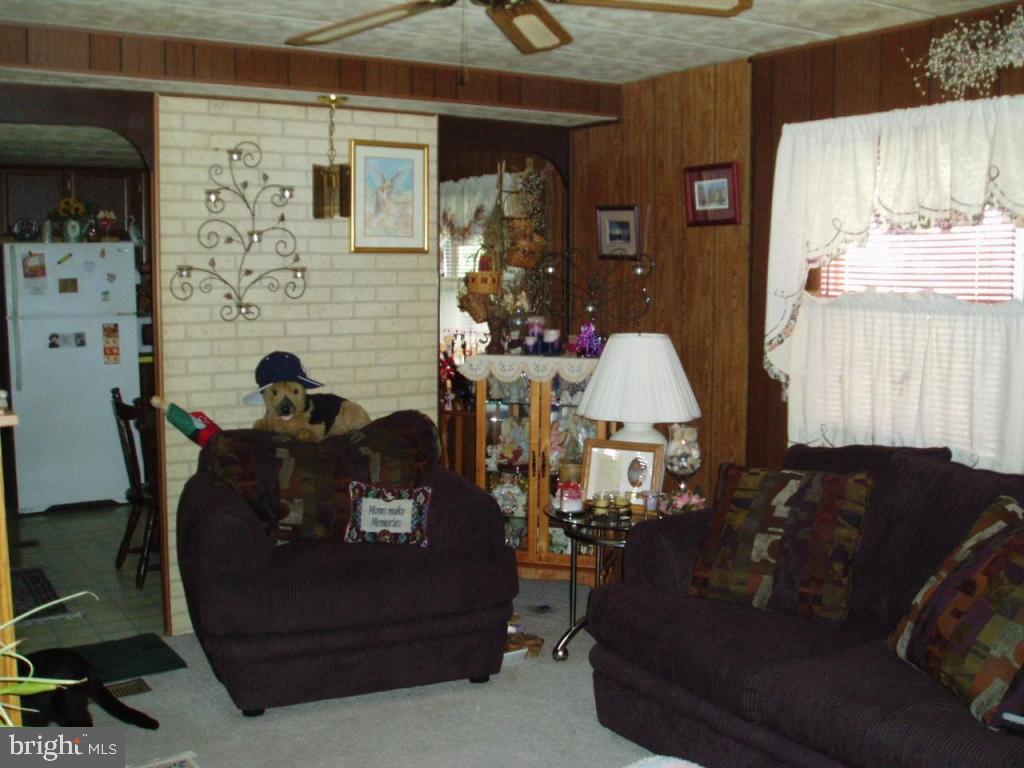 68 Ridgewood Manor Manheim, PA 17545 - Photo 3 of 4 a living room with furniture and a window