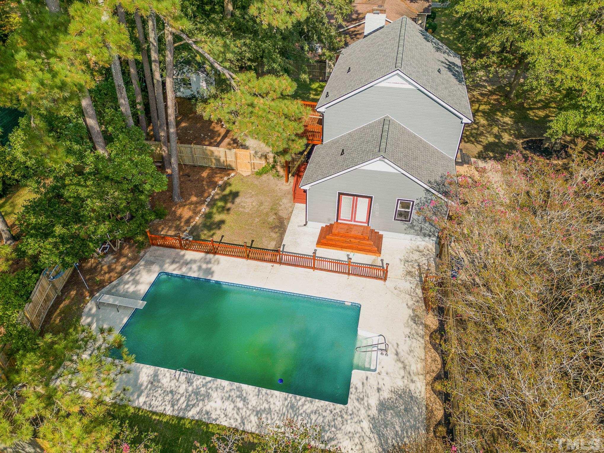 14 Eden Drive Smithfield, NC 27577 - Photo 2 of 37 a aerial view of a house with a yard and large trees