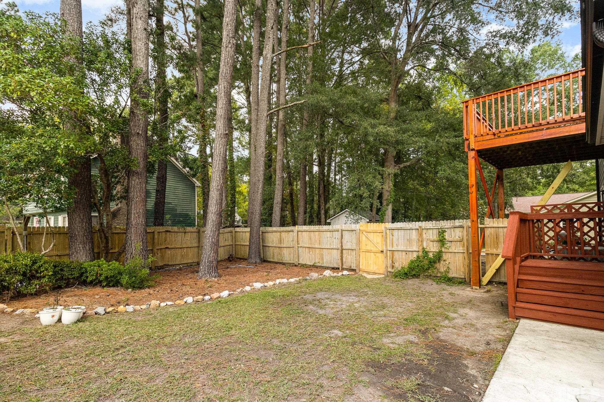 14 Eden Drive Smithfield, NC 27577 - Photo 31 of 37 a view of backyard with a barn and large trees