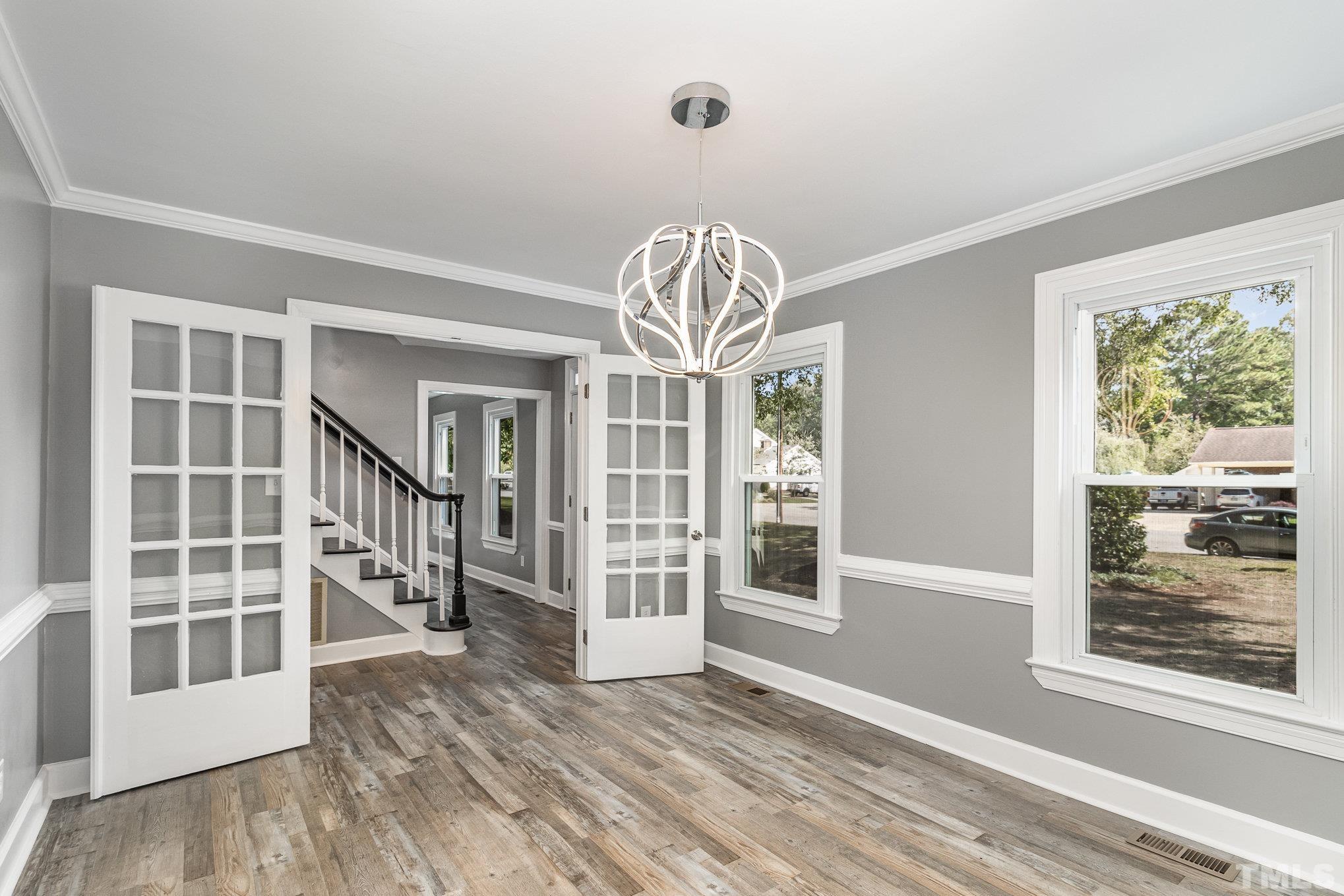 14 Eden Drive Smithfield, NC 27577 - Photo 10 of 37 a view of entryway with wooden floor and windows