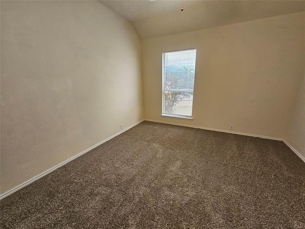 7851 Orland Park Circle Fort Worth, TX 76137 - Photo 17 of 35 an empty room with windows