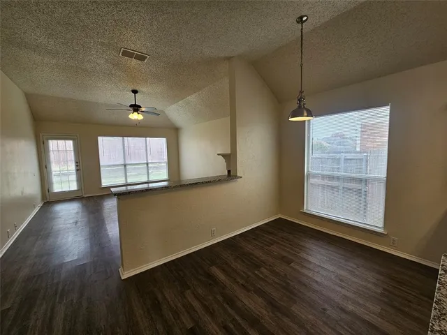 a living room with a fireplace
