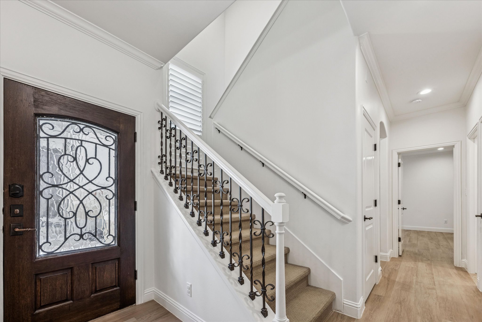 3303 Pecos Street, Unit B Austin, TX 78703 - Photo 20 of 30 a view of entryway with stairs and wooden floor