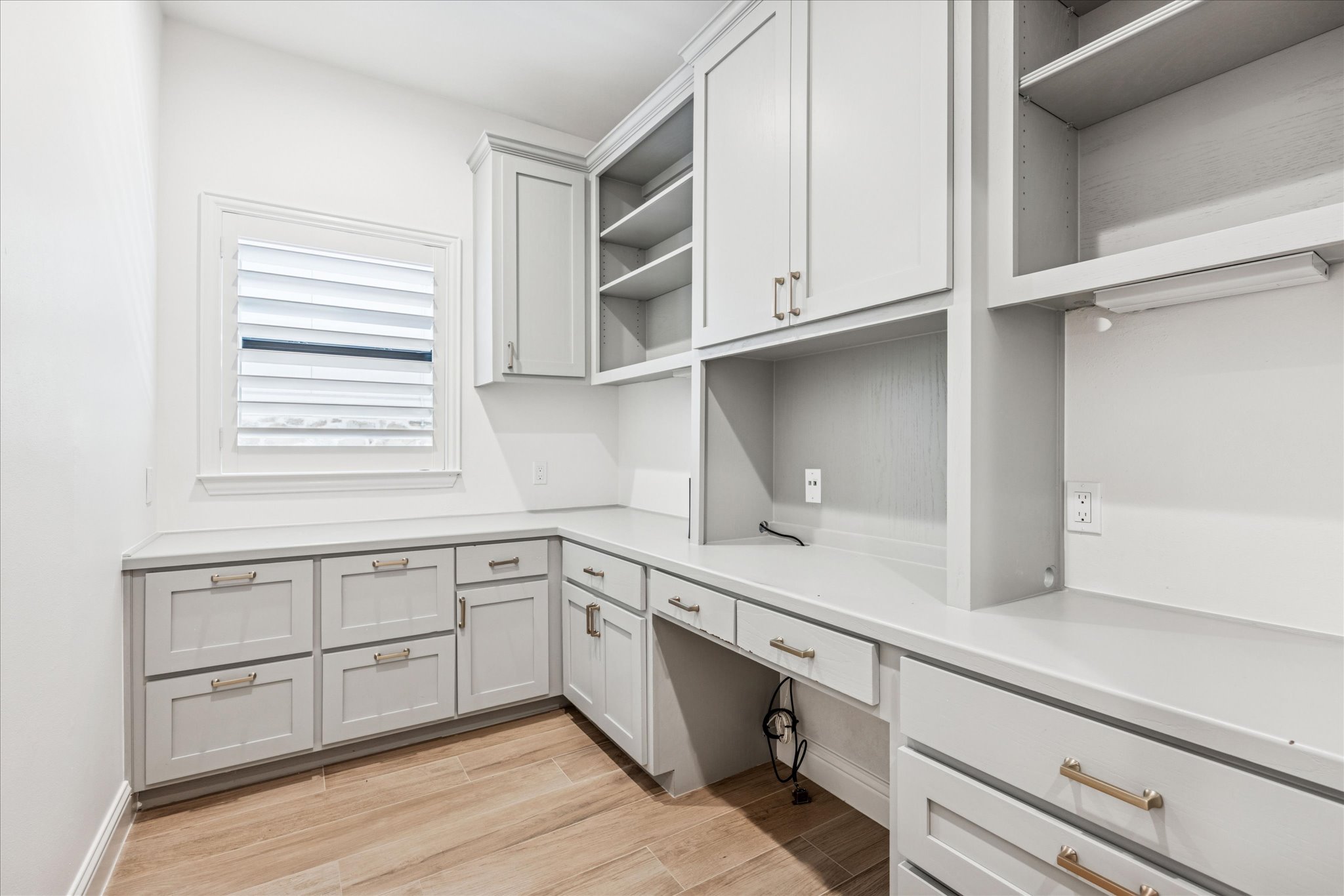 3303 Pecos Street, Unit B Austin, TX 78703 - Photo 27 of 30 a kitchen with a sink cabinets and window