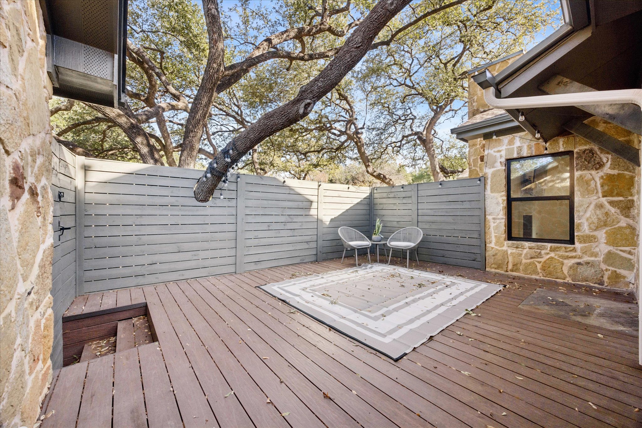 3303 Pecos Street, Unit B Austin, TX 78703 - Photo 30 of 30 a view of a wooden floor with a bench
