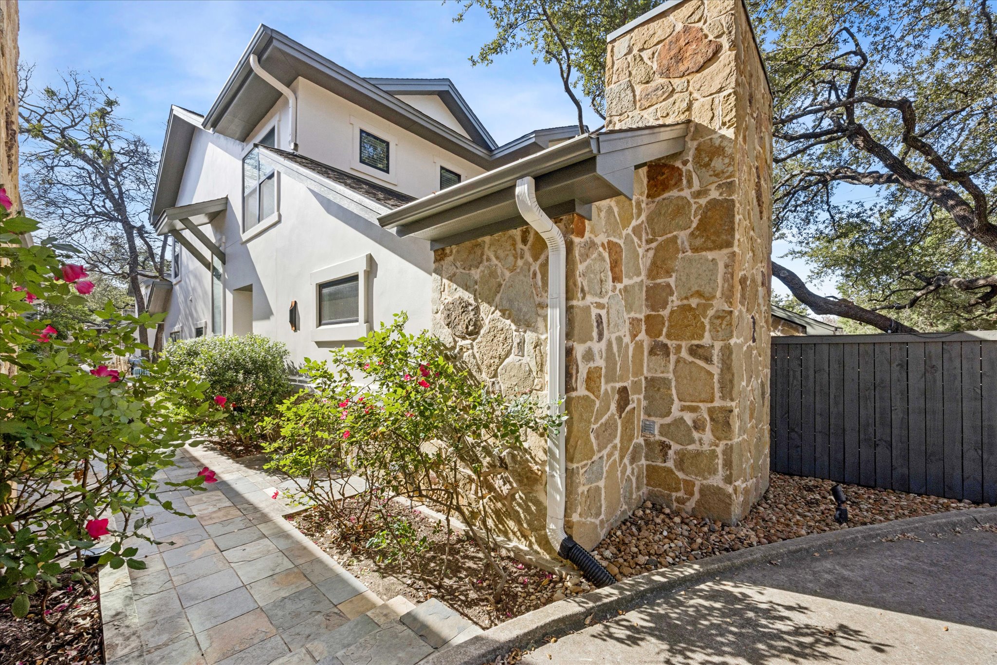 3303 Pecos Street, Unit B Austin, TX 78703 - Photo 3 of 30 a view of a front of house with a yard