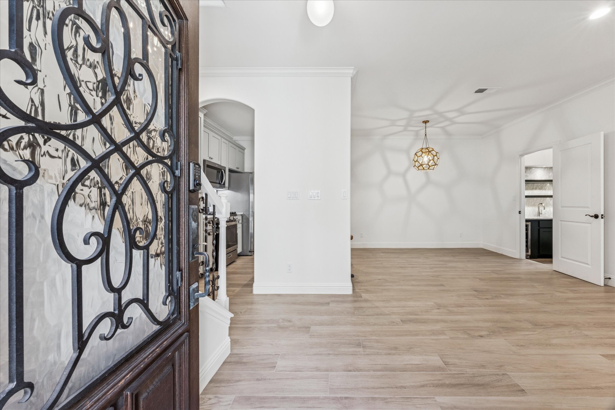 3303 Pecos Street, Unit B Austin, TX 78703 - Photo 4 of 30 a view of an entryway with wooden floor