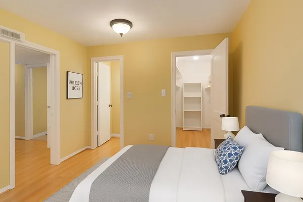 a view of hallway with wooden floor