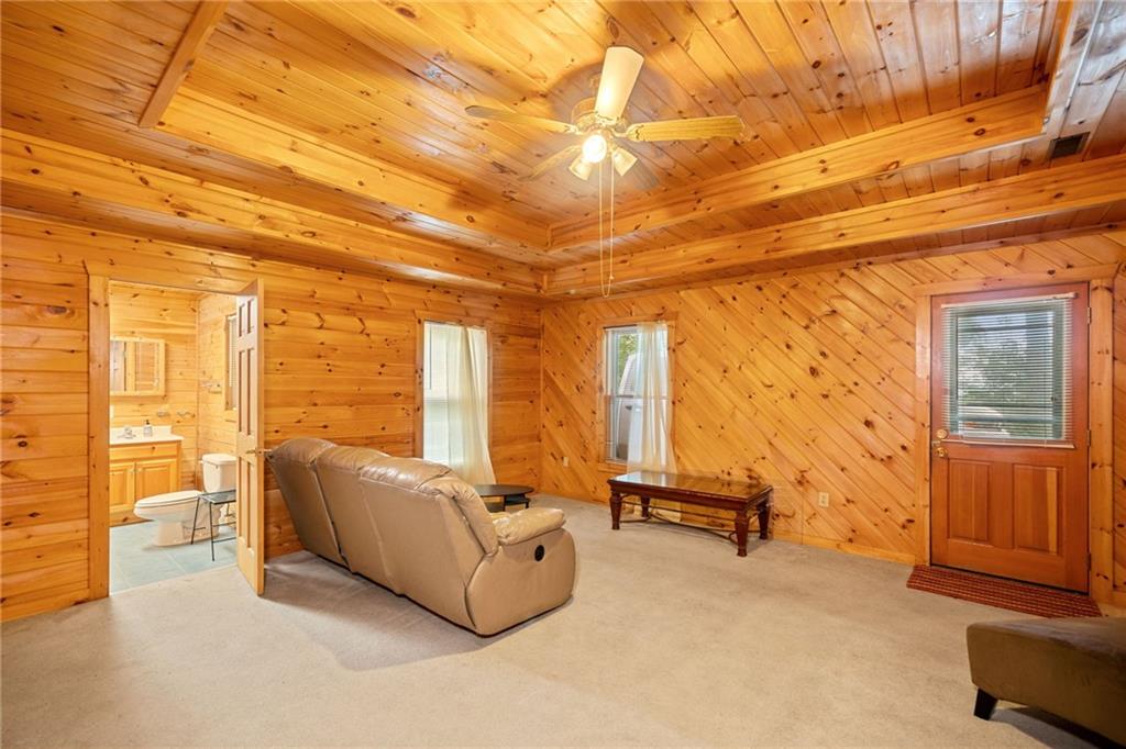 5 Tally Mountain Road North Jasper, GA 30143 - Photo 13 of 58 a living room with furniture and a refrigerator