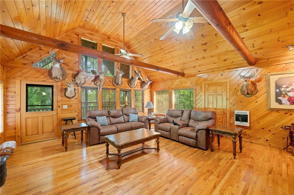 5 Tally Mountain Road North Jasper, GA 30143 - Photo 22 of 58 a living room with furniture and a wooden floor