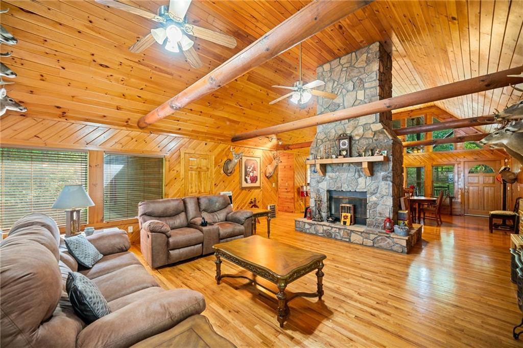 5 Tally Mountain Road North Jasper, GA 30143 - Photo 34 of 58 a living room with furniture and a fireplace