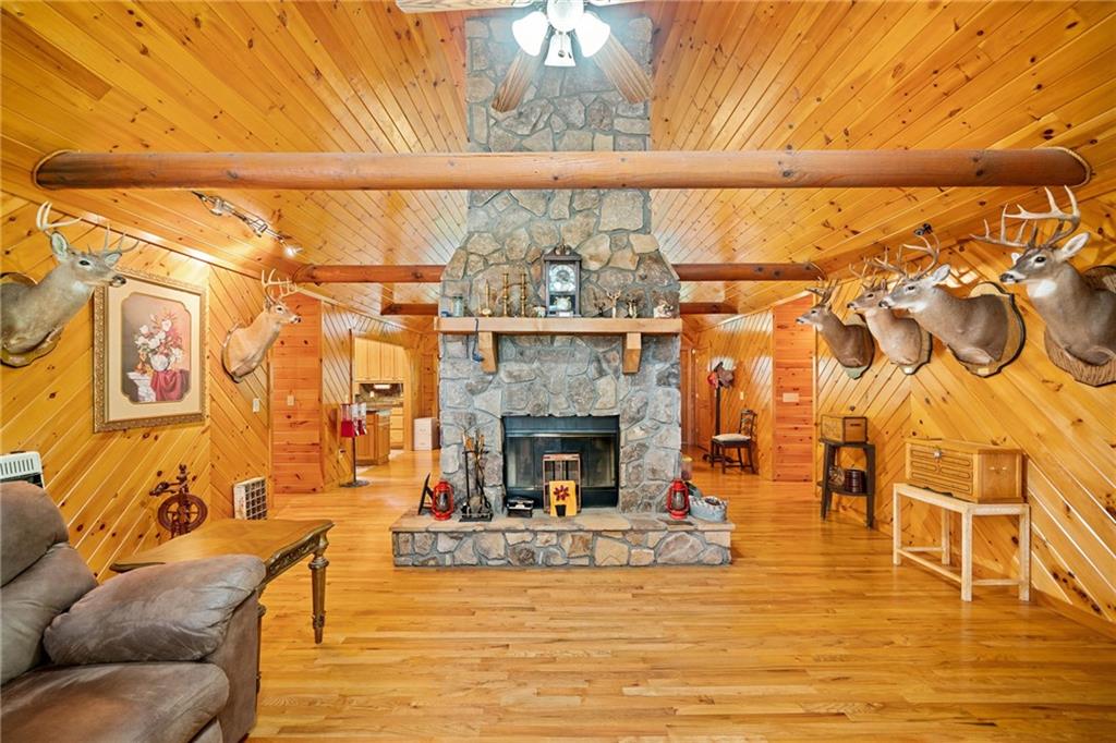 5 Tally Mountain Road North Jasper, GA 30143 - Photo 35 of 58 a living room with fireplace furniture and a floor to ceiling window