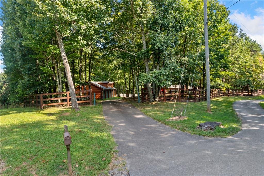 5 Tally Mountain Road North Jasper, GA 30143 - Photo 46 of 58 a view of a park with swings