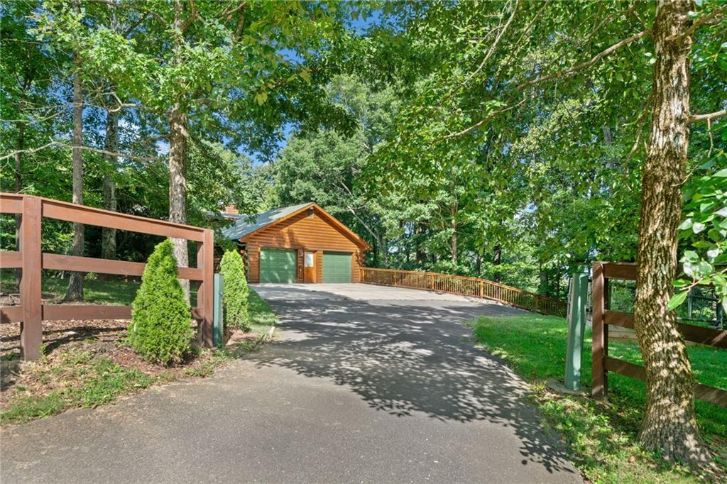 5 Tally Mountain Road North Jasper, GA 30143 - Photo 49 of 58 a view of a back yard of the house