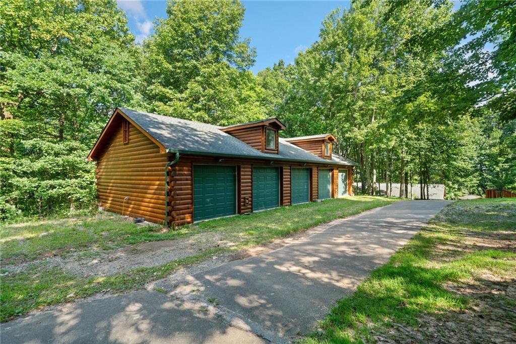 5 Tally Mountain Road North Jasper, GA 30143 - Photo 56 of 58 a front view of a house with yard and tree