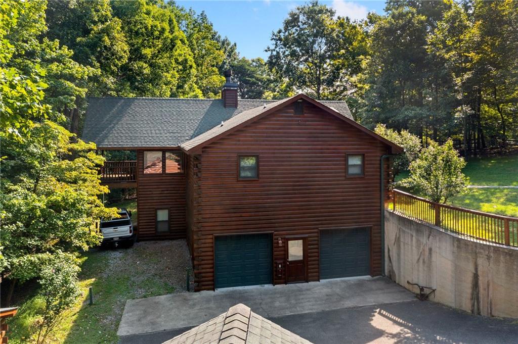 5 Tally Mountain Road North Jasper, GA 30143 - Photo 10 of 58 a front view of a house with garden