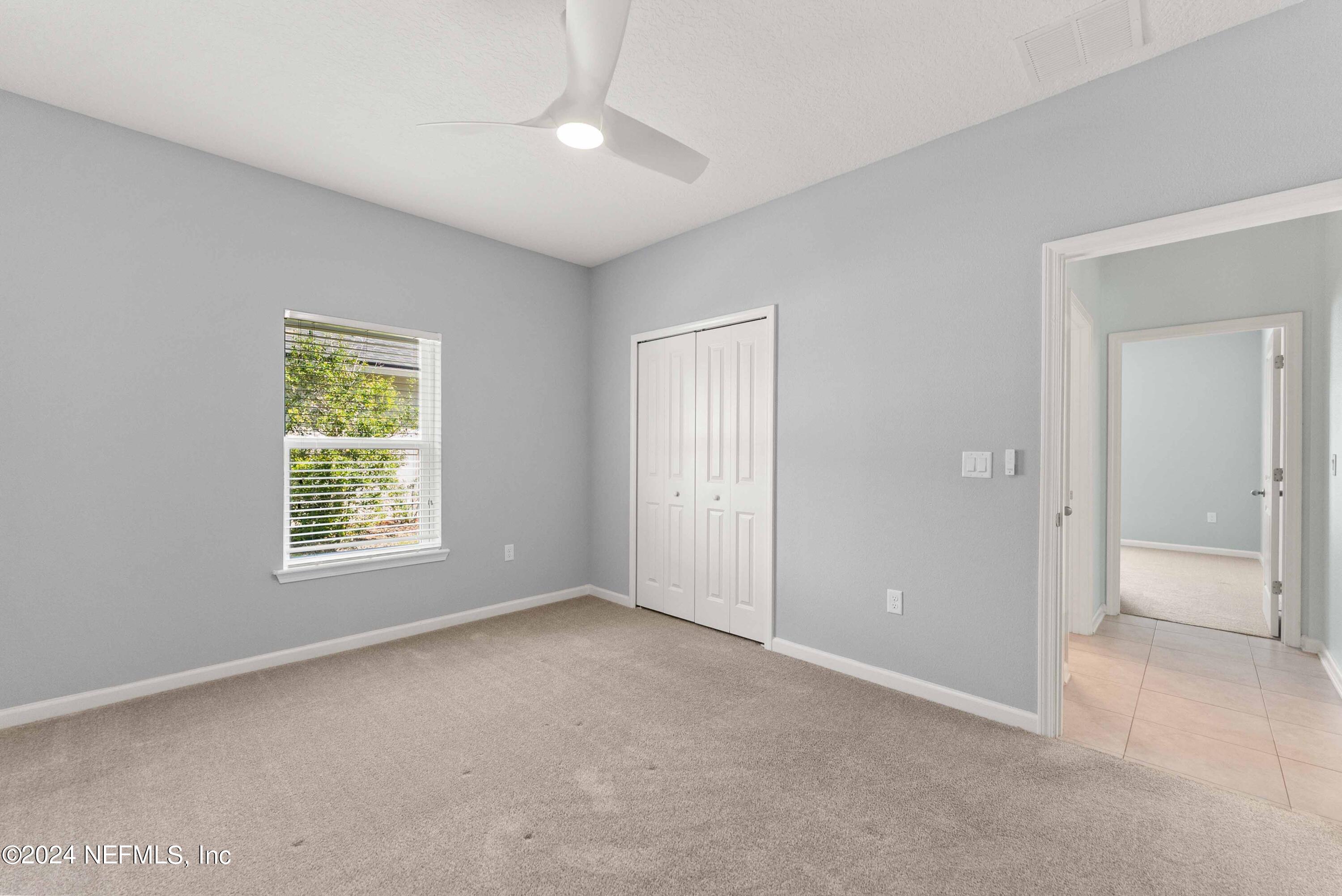 15 Greenview Lane St. Augustine, FL 32092 - Photo 19 of 41 a view of an empty room with a window