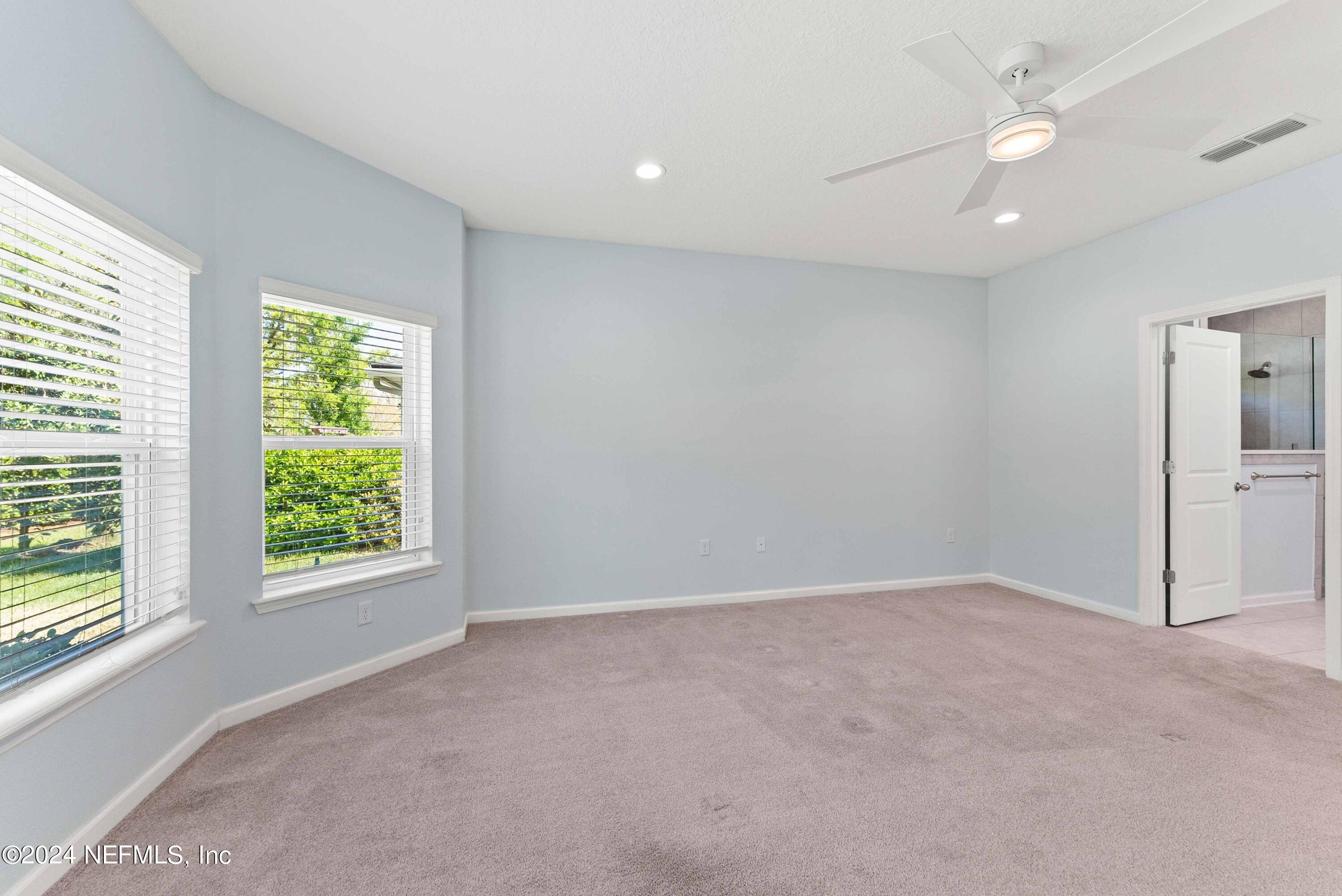 15 Greenview Lane St. Augustine, FL 32092 - Photo 24 of 41 an empty room with windows and closet