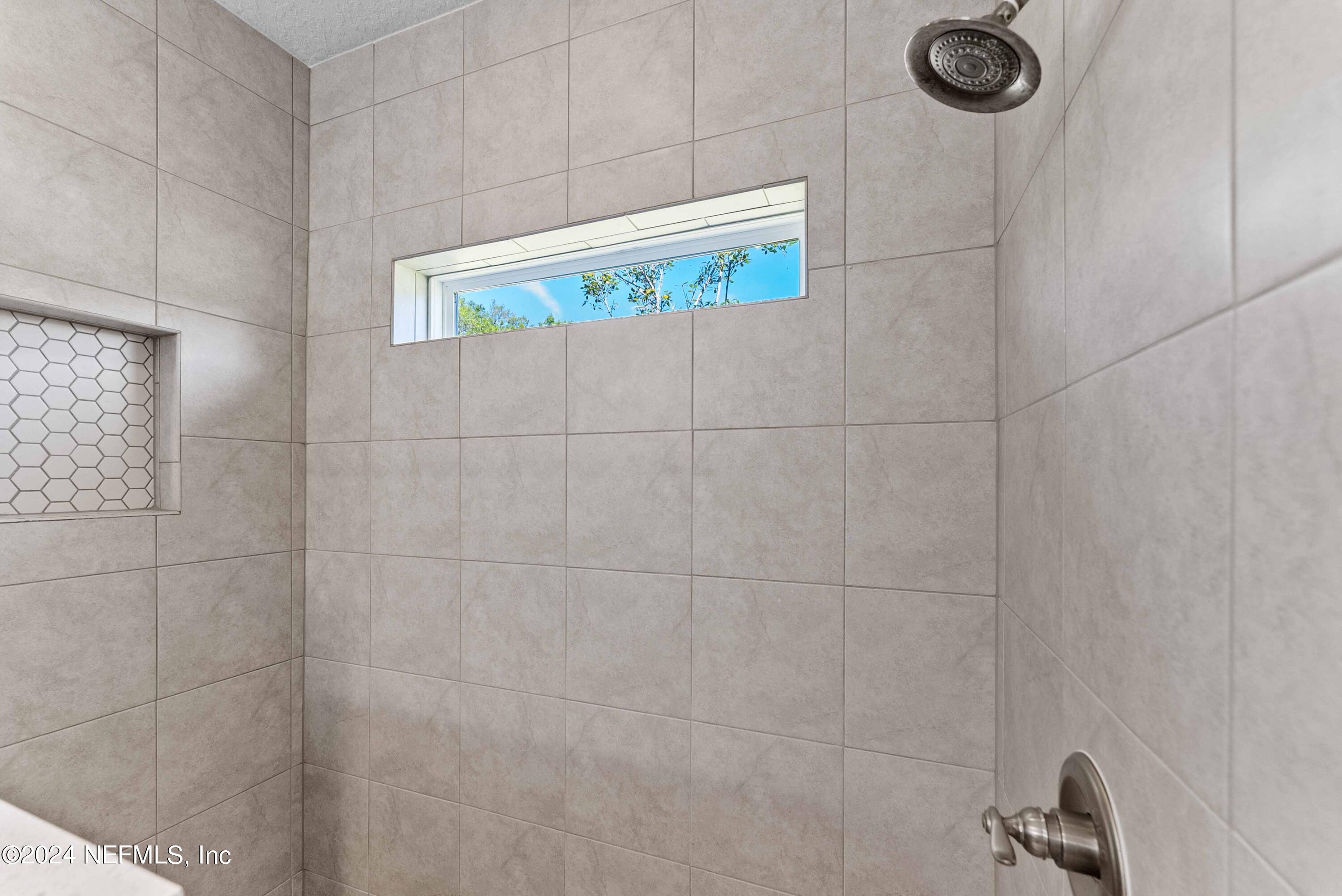 15 Greenview Lane St. Augustine, FL 32092 - Photo 27 of 41 a bathroom with a sink and a shower