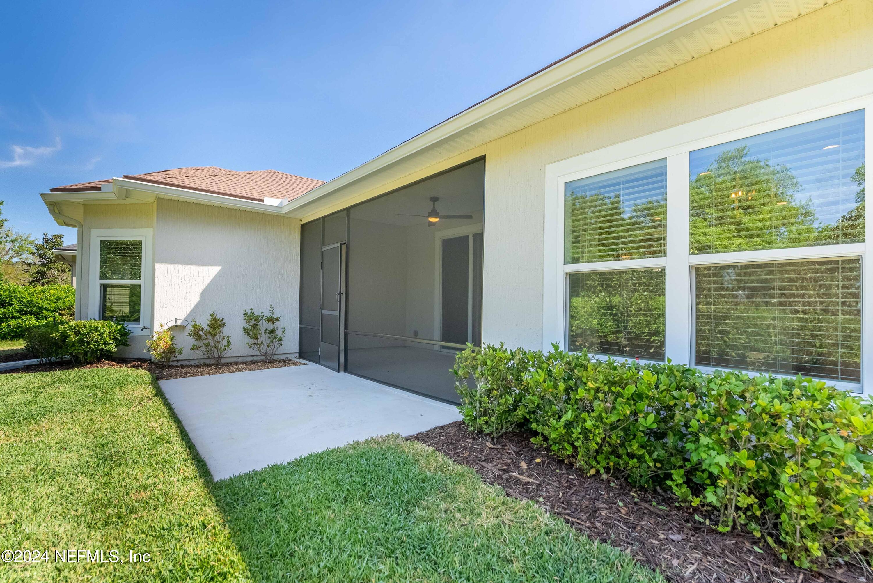 15 Greenview Lane St. Augustine, FL 32092 - Photo 32 of 41 a front view of a house with a yard