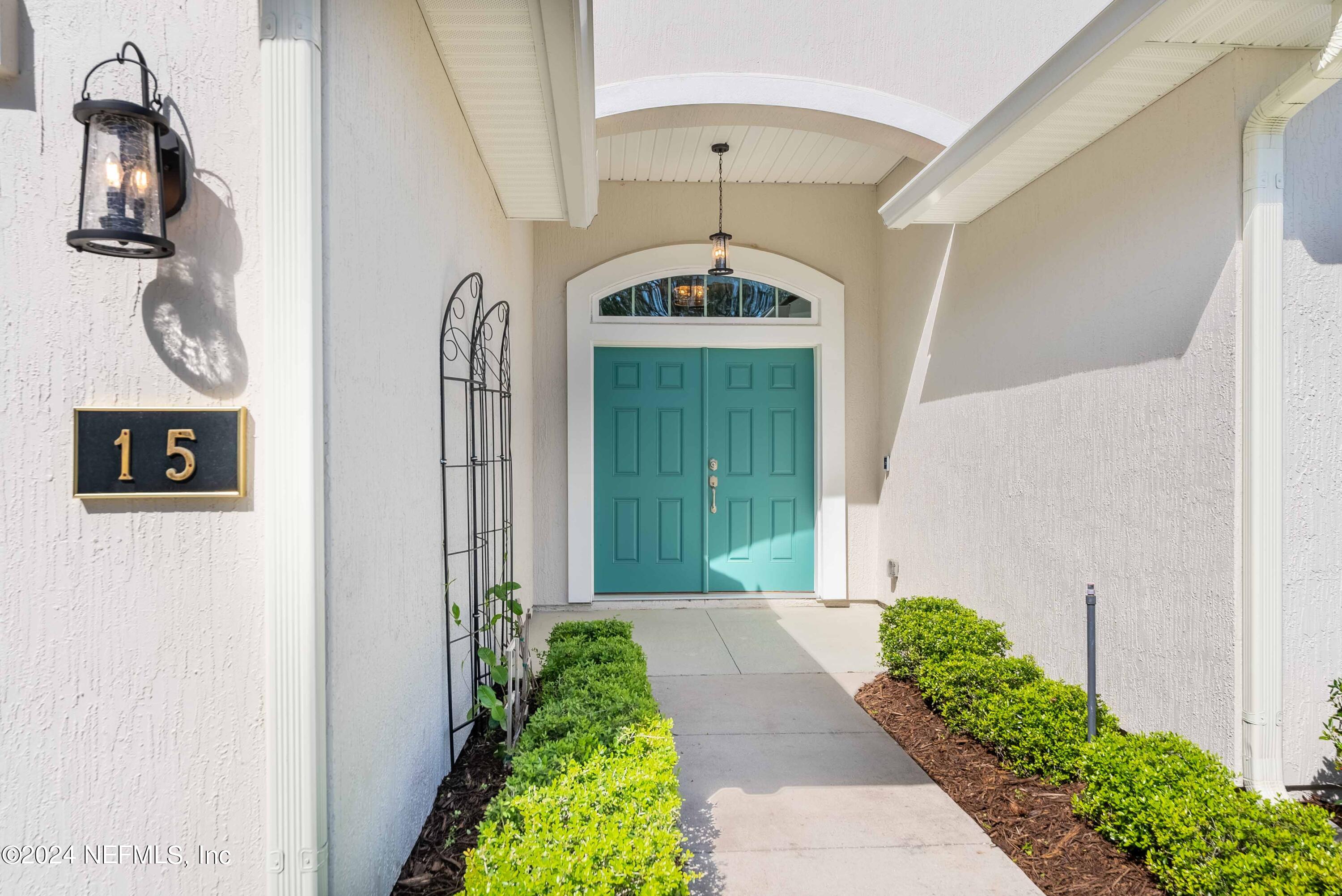 15 Greenview Lane St. Augustine, FL 32092 - Photo 4 of 41 a front view of a house with a yard