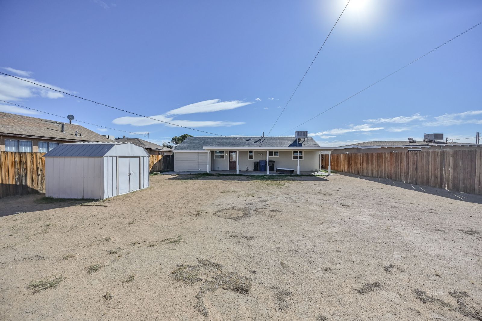 233 North Alvord Street Ridgecrest, CA 93555 - Photo 32 of 32 a front view of a house with a yard