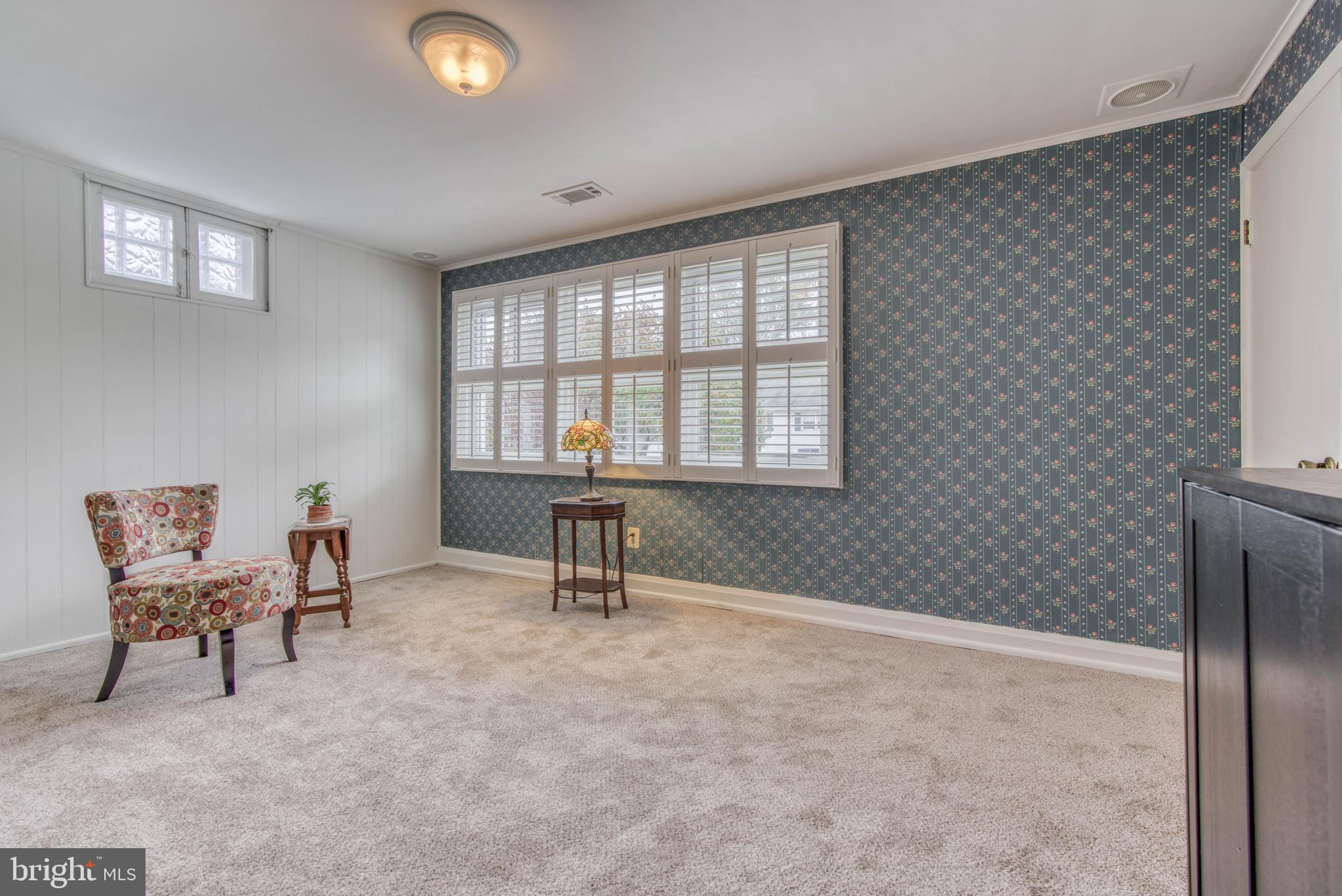 102 Belmore Road Lutherville-Timonium, MD 21093 - Photo 5 of 28 Den with wood shutters