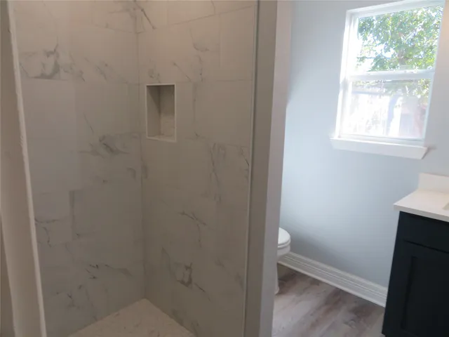 a bathroom with a toilet