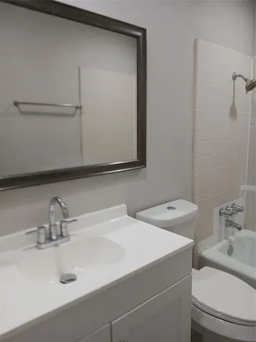 a bathroom with a sink and a toilet