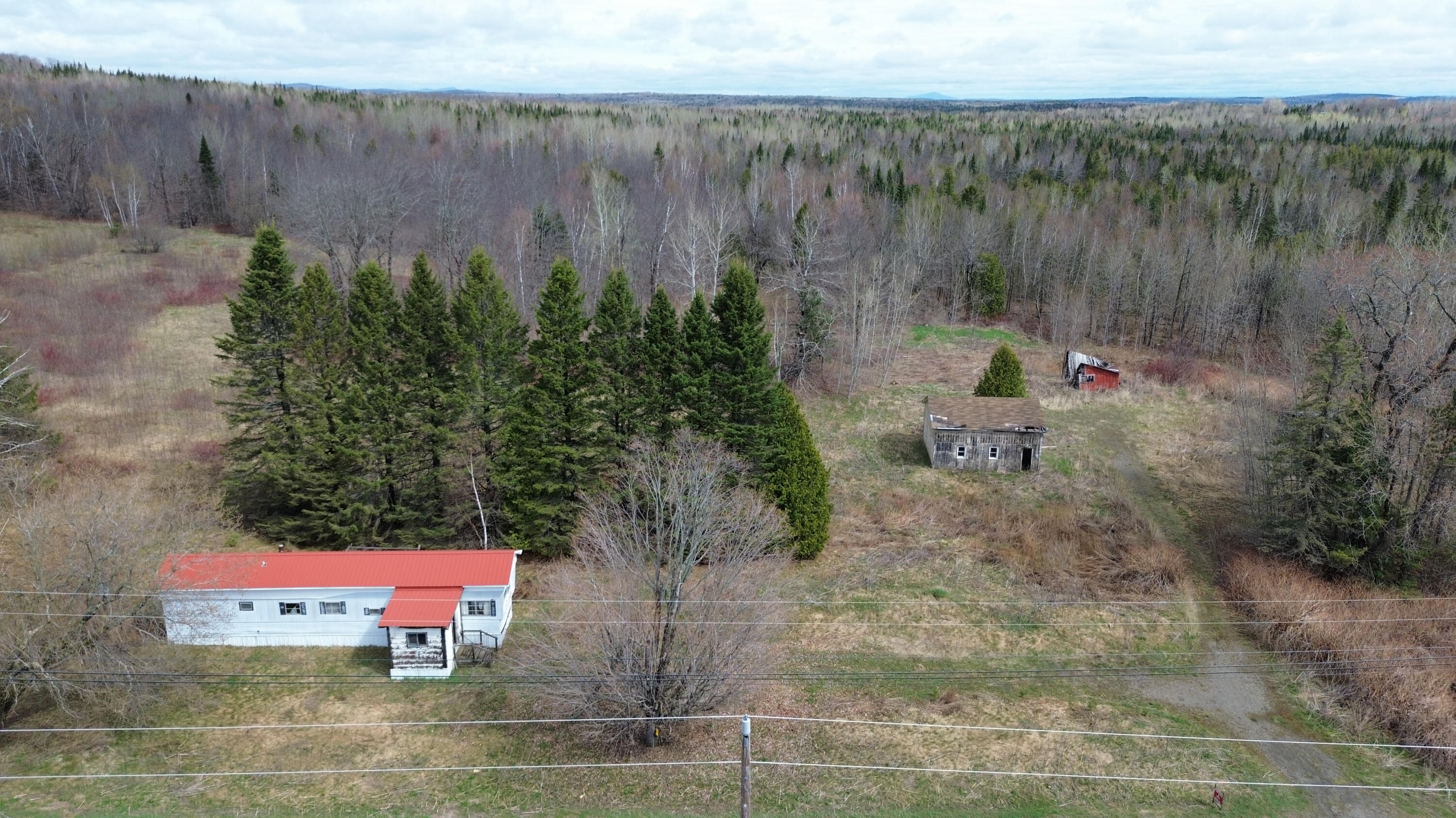 1063 Ludlow Road Ludlow, ME 04730 - Photo 2 of 36 DJI_0757