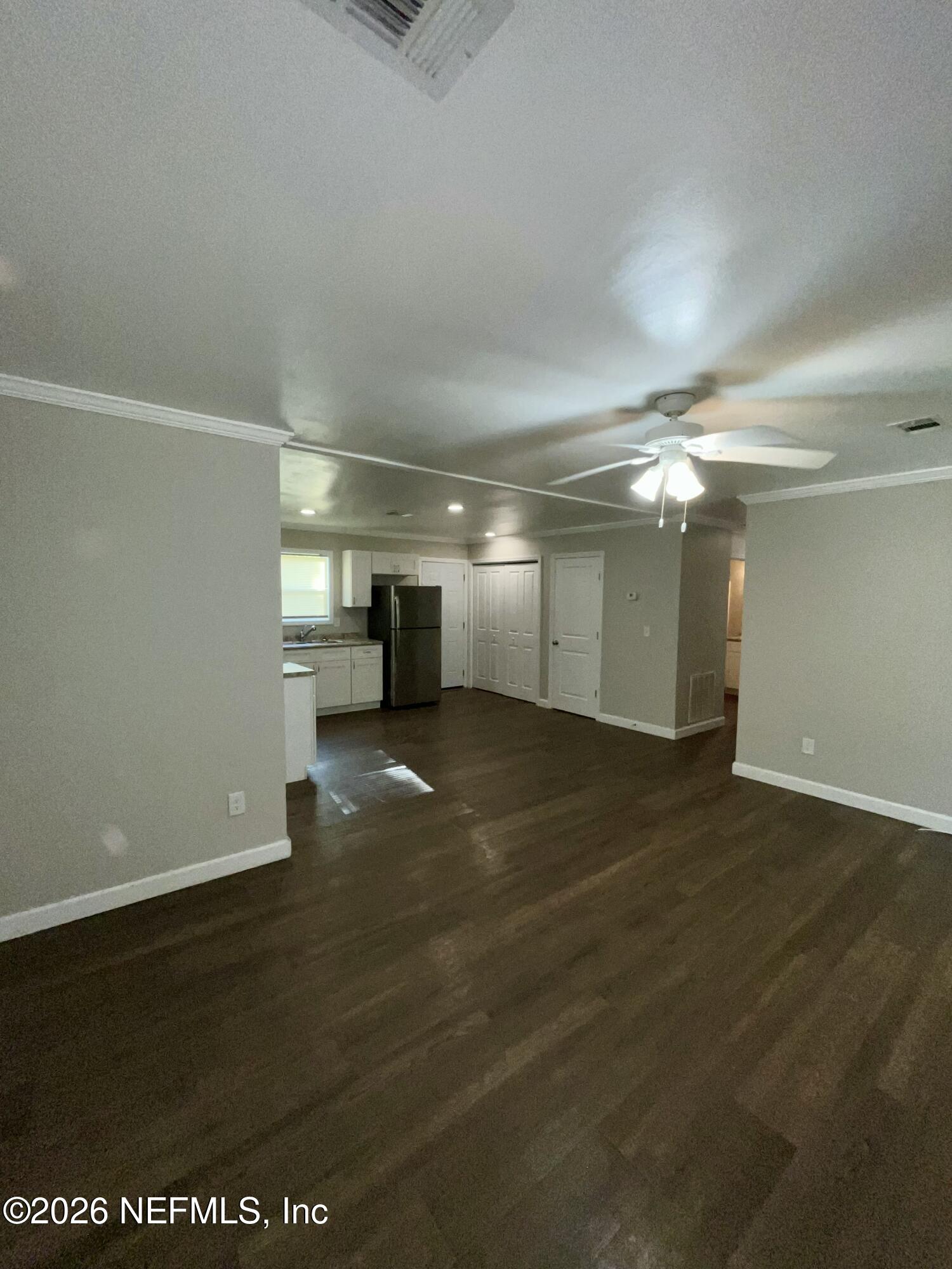 2017 Talladega Road Jacksonville, FL 32209 - Photo 15 of 34 a view of empty room with wooden floor