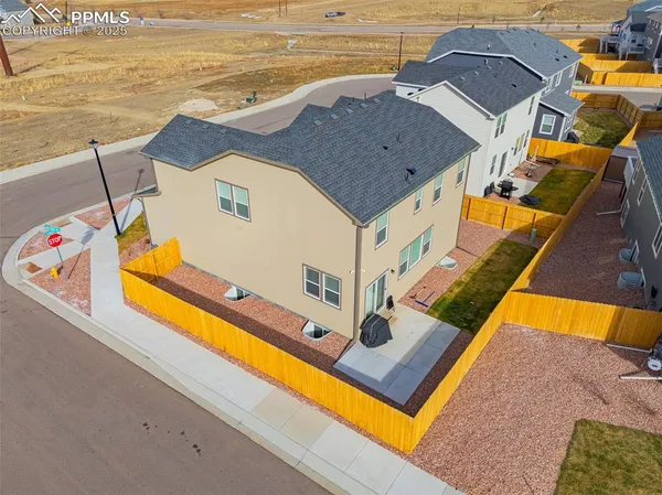 a view of an ocean with a house