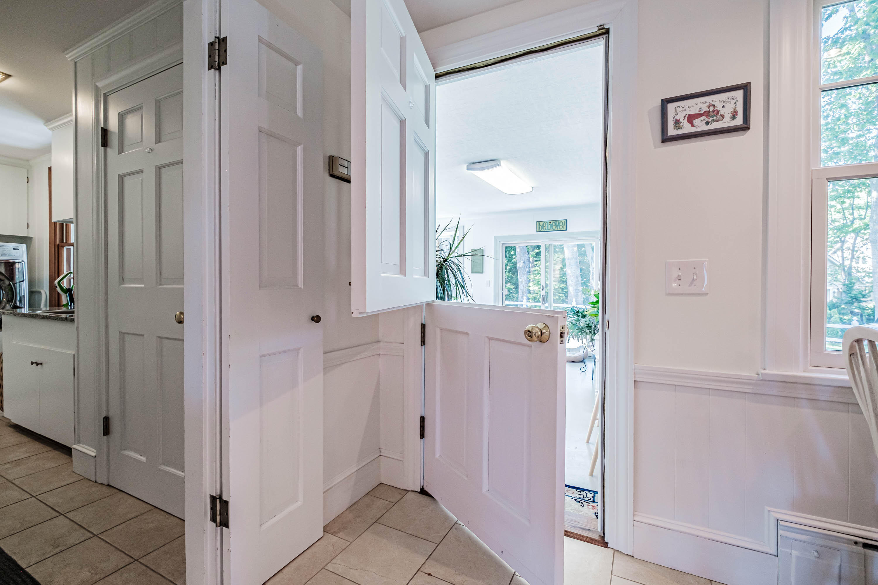 14 Sea Cove Road Cumberland Foreside, ME 04110 - Photo 28 of 92 split door to sunroom from Kitchen