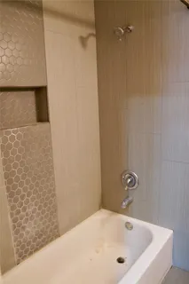 a bathroom with a bathtub