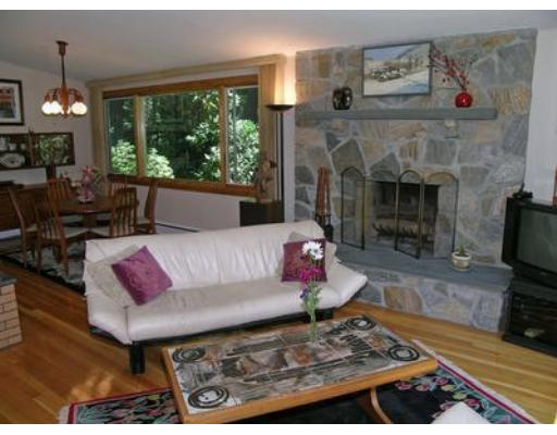24 Whipple Road Lexington, MA 02420 - Photo 8 of 20 a living room with furniture and a fireplace