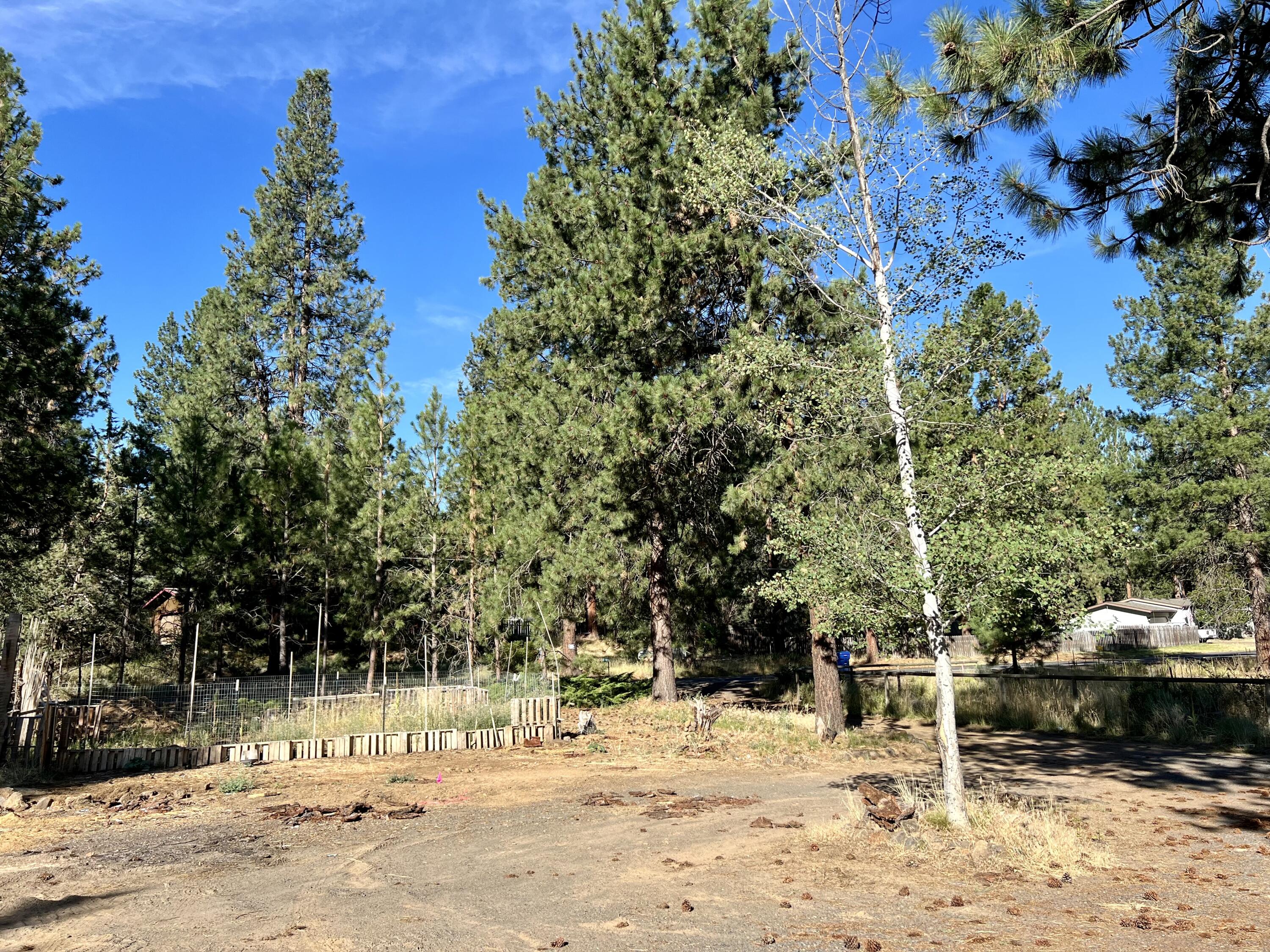 60492 Zuni Road Bend, OR 97702 - Photo 16 of 19 Circular Driveway/Parking Area + Garden