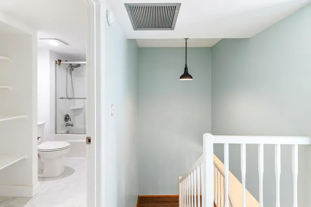 a view of a hallway with entryway